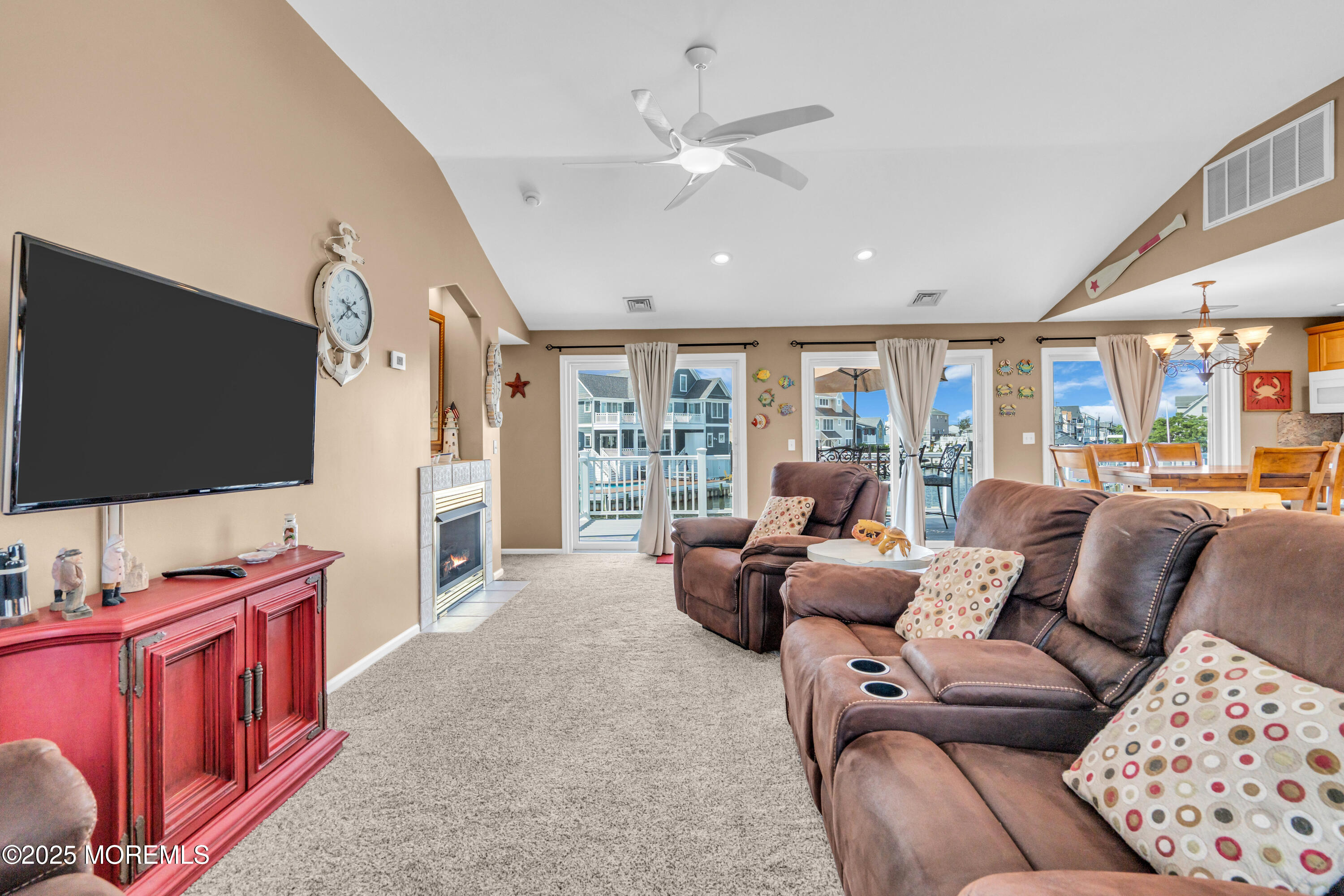 316 Ormond Drive Lavallette, NJ 08735 - Photo 12 of 29 a living room with furniture and a flat screen tv