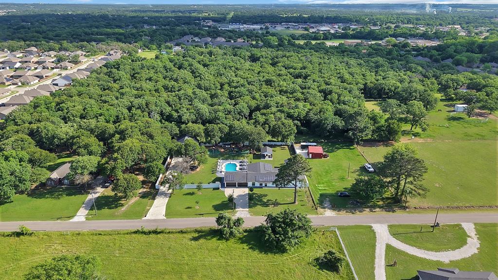 620 East 6th Street Springtown, TX 76082 - Photo 38 of 40 an aerial view of a house with a yard