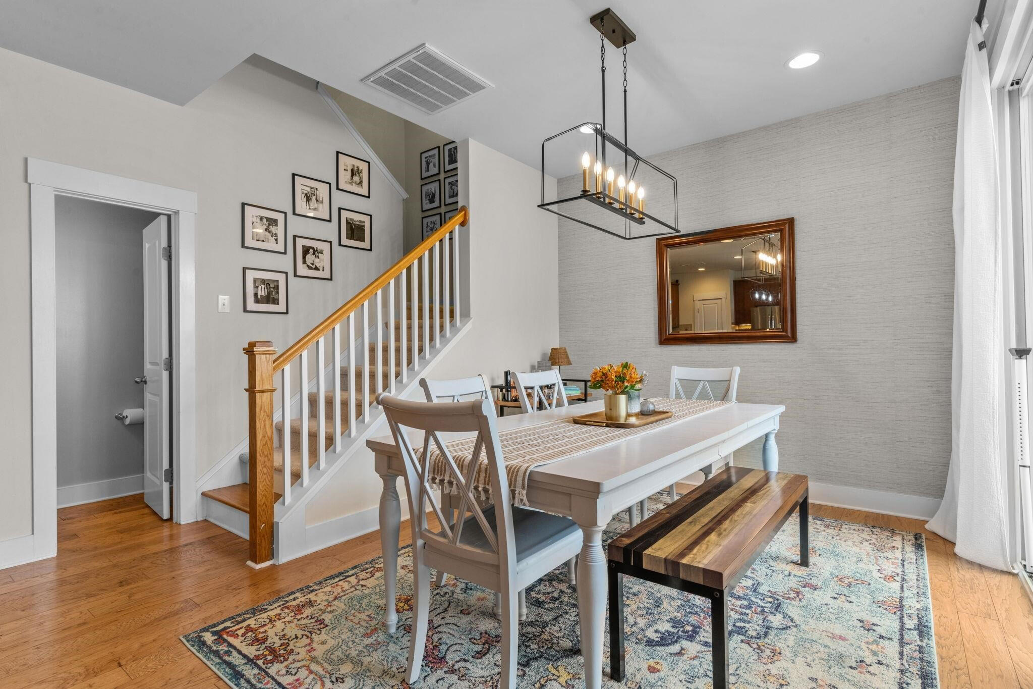 9304 Sevillanos Walk Raleigh, NC 27617 - Photo 18 of 41 a view of a dining room with furniture