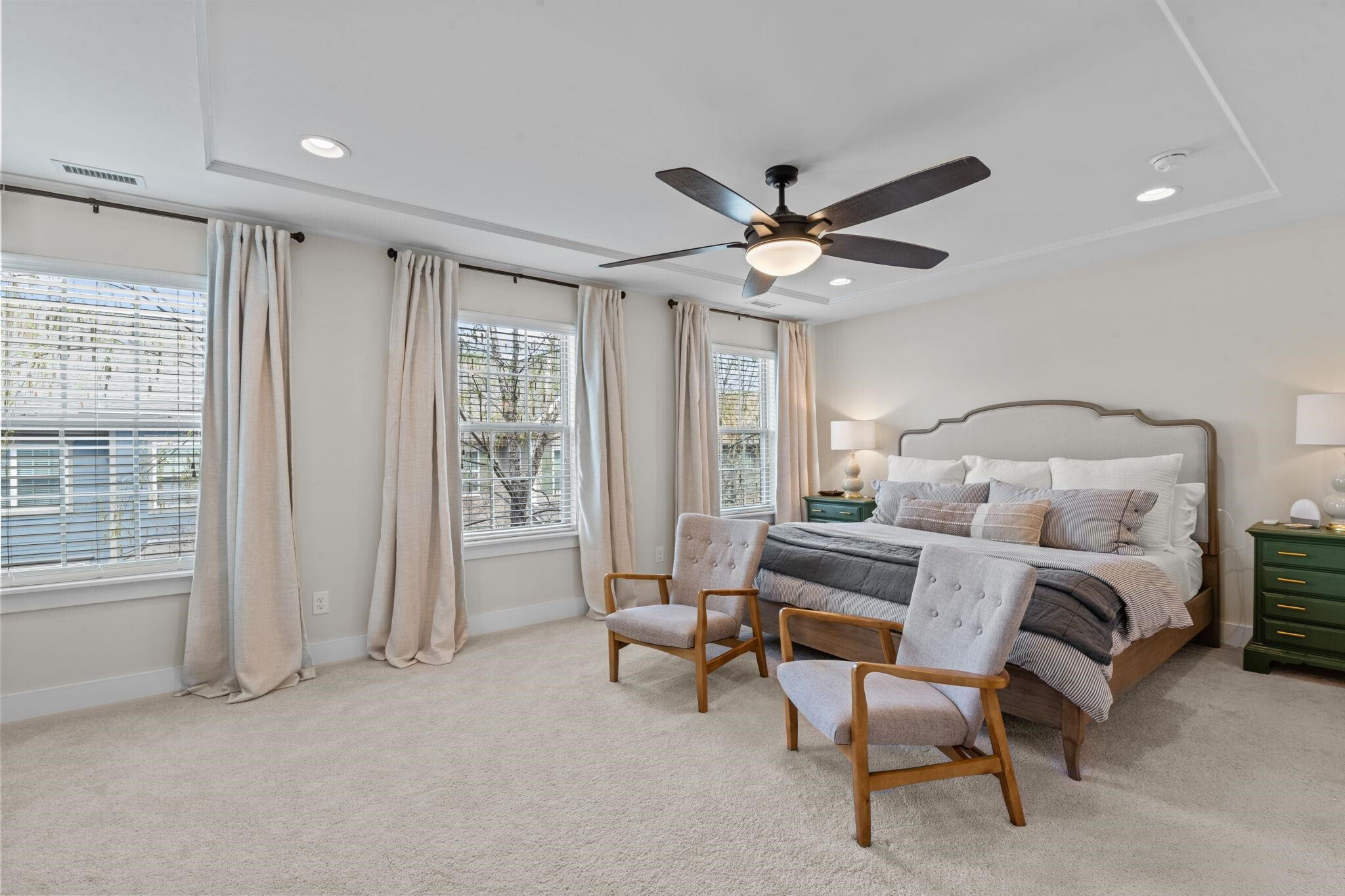 9304 Sevillanos Walk Raleigh, NC 27617 - Photo 19 of 41 a bedroom with furniture and a large window