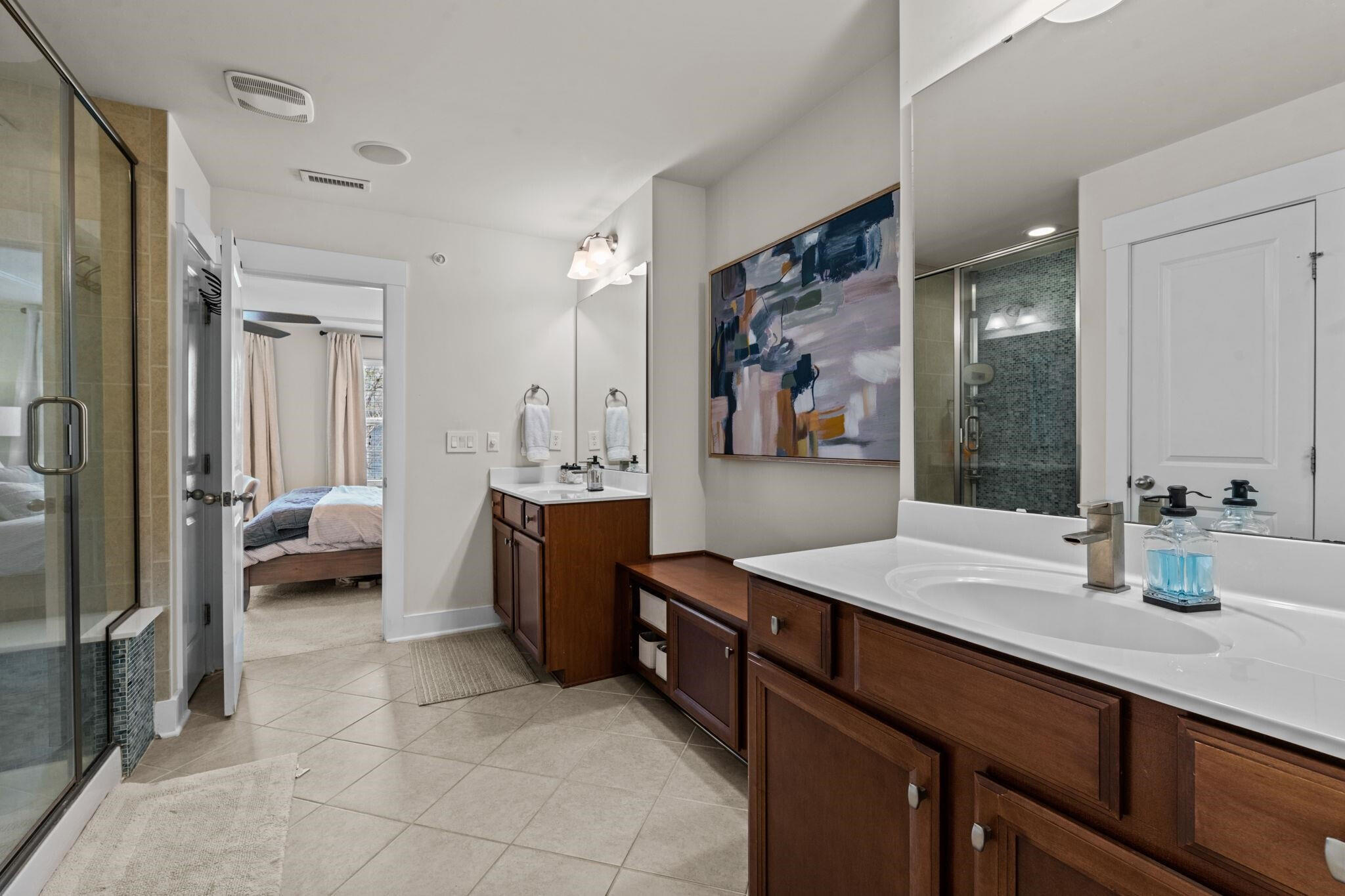 9304 Sevillanos Walk Raleigh, NC 27617 - Photo 23 of 41 a view of bathroom with sink and mirror