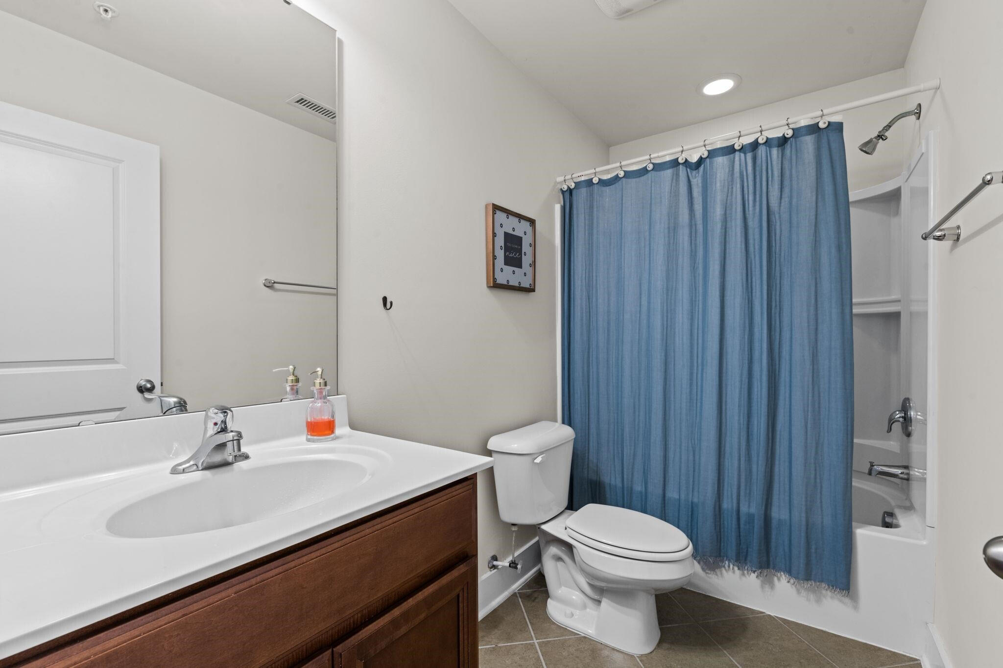 9304 Sevillanos Walk Raleigh, NC 27617 - Photo 29 of 41 a bathroom with a sink toilet and shower