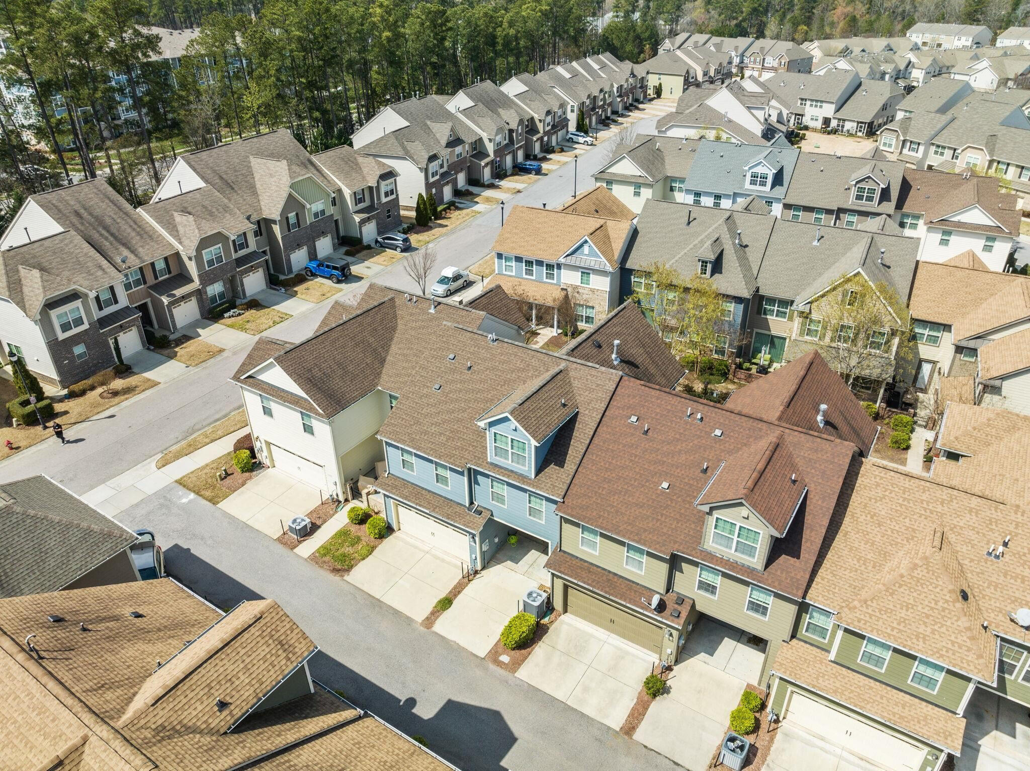 9304 Sevillanos Walk Raleigh, NC 27617 - Photo 6 of 41 an aerial view of residential house with parking
