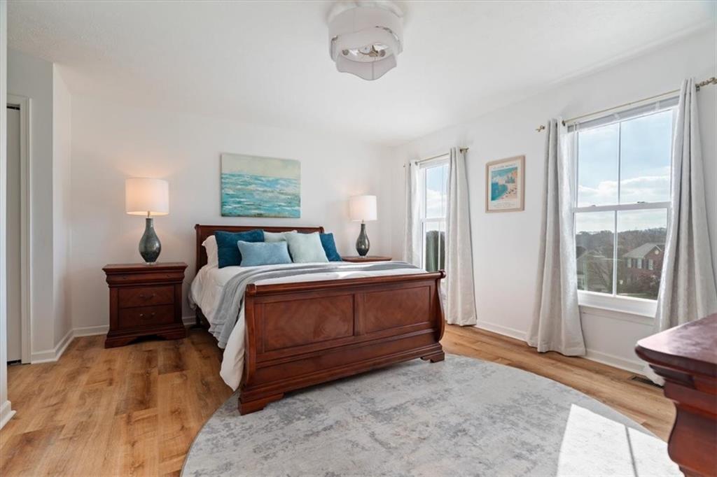216 Lori Road Gibsonia, PA 15044 - Photo 25 of 50 The primary suite offers a calm retreat with generous proportions and natural light from upgraded 2025 energy-efficient windows featuring modern gridlines.