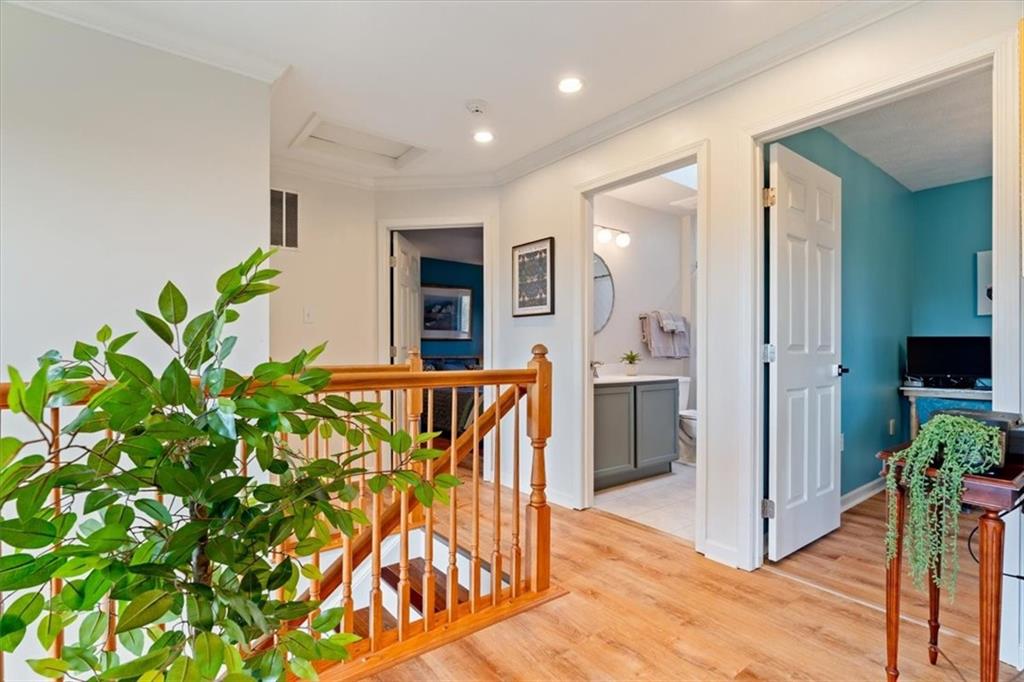 216 Lori Road Gibsonia, PA 15044 - Photo 33 of 50 Upstairs, warm LifeProof oak LVP flooring creates a cohesive, timeless flow. Durable. Practical. Elevated.