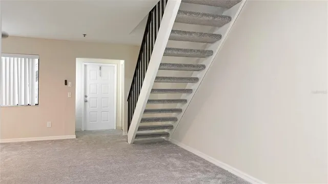 a view of an entryway with stairs