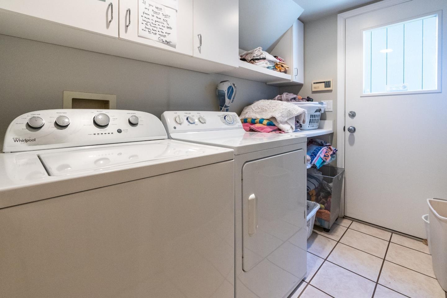 545 Beach Drive Aptos, CA 95003 - Photo 19 of 55 a utility room with dryer and washer