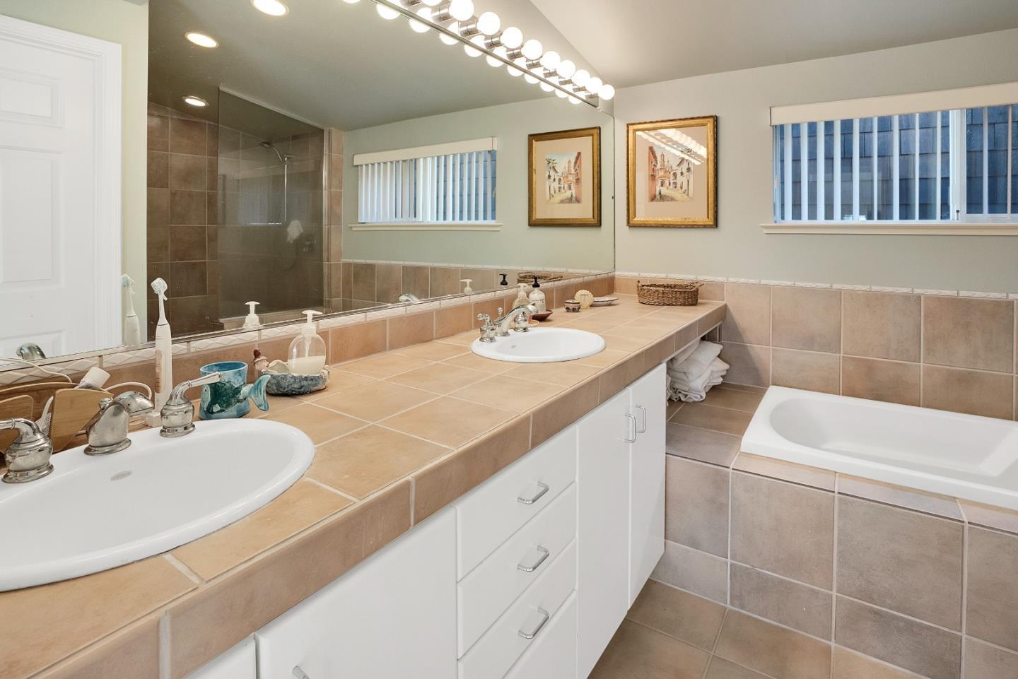 545 Beach Drive Aptos, CA 95003 - Photo 27 of 55 a bathroom with a sink and a mirror