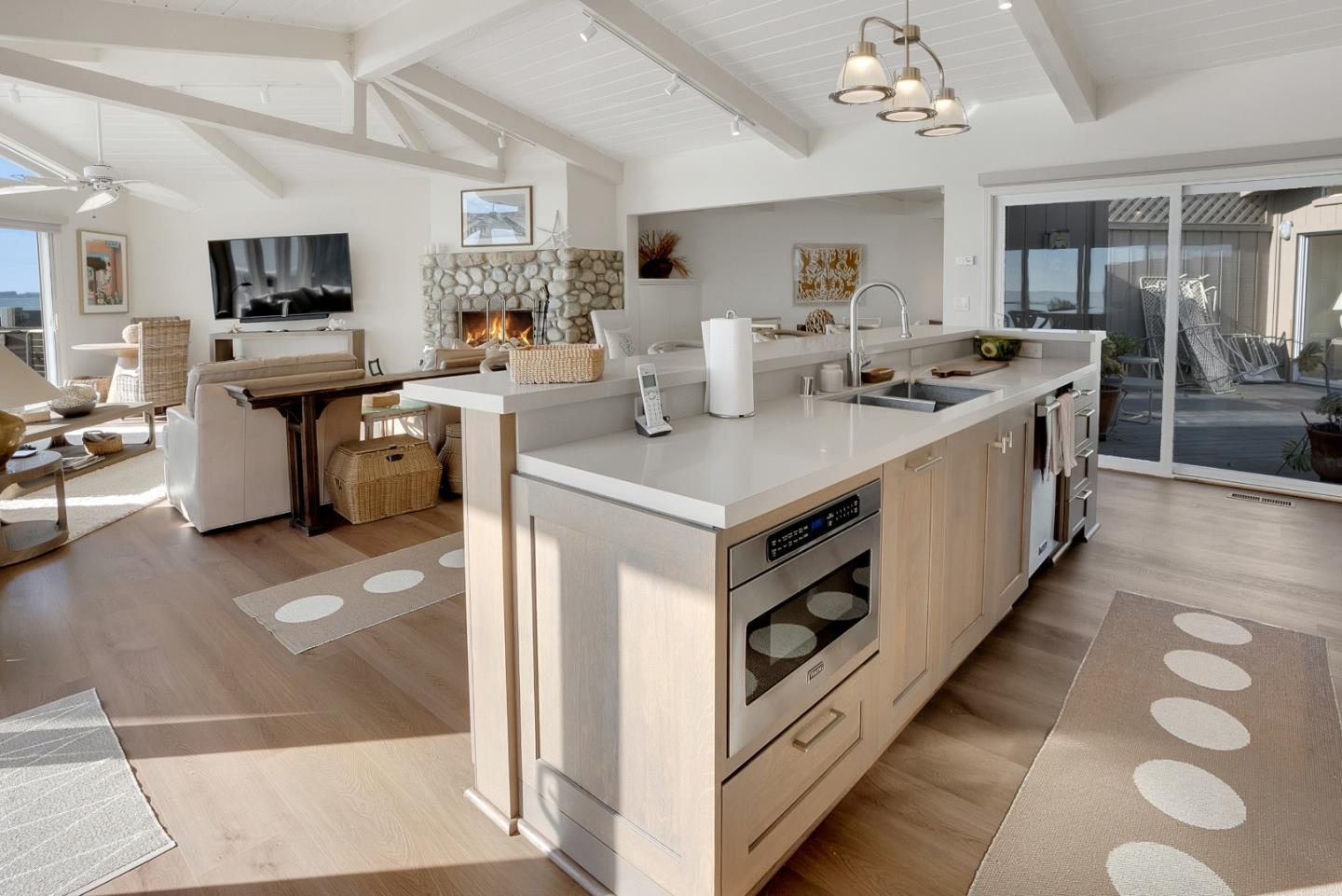 545 Beach Drive Aptos, CA 95003 - Photo 46 of 55 a kitchen with stainless steel appliances a sink stove and cabinets