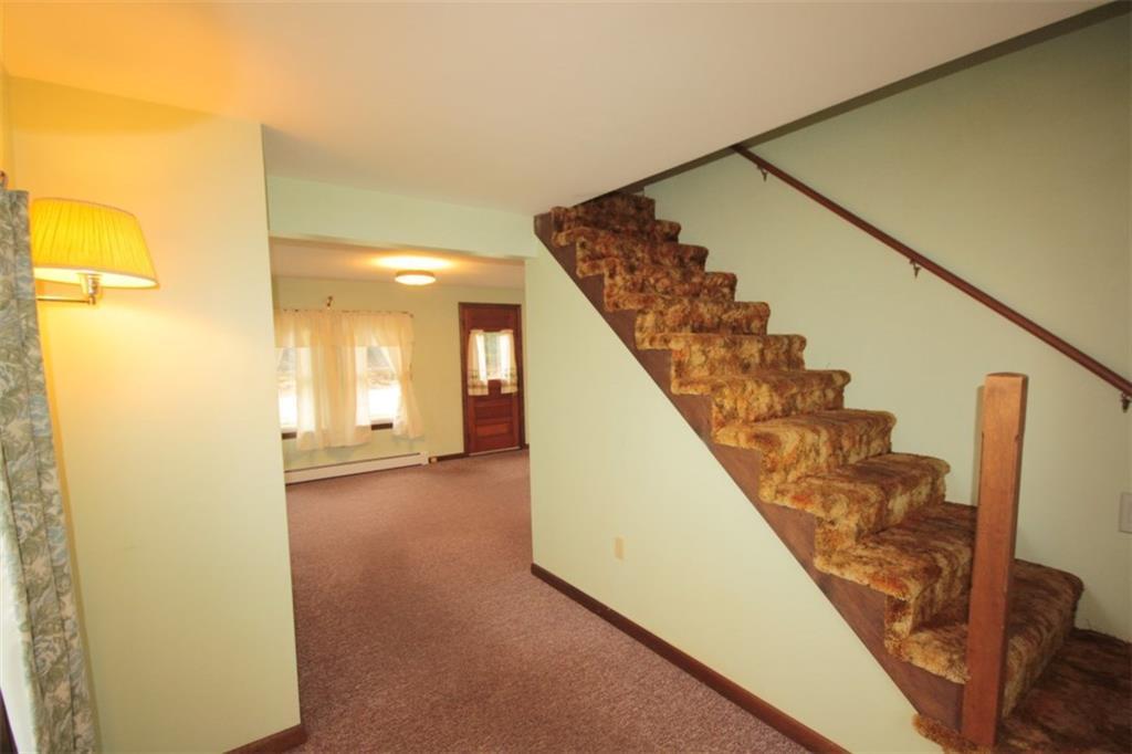 11 Middle Road Boothbay Harbor, ME 04538 - Photo 12 of 18 The den, with carpeting