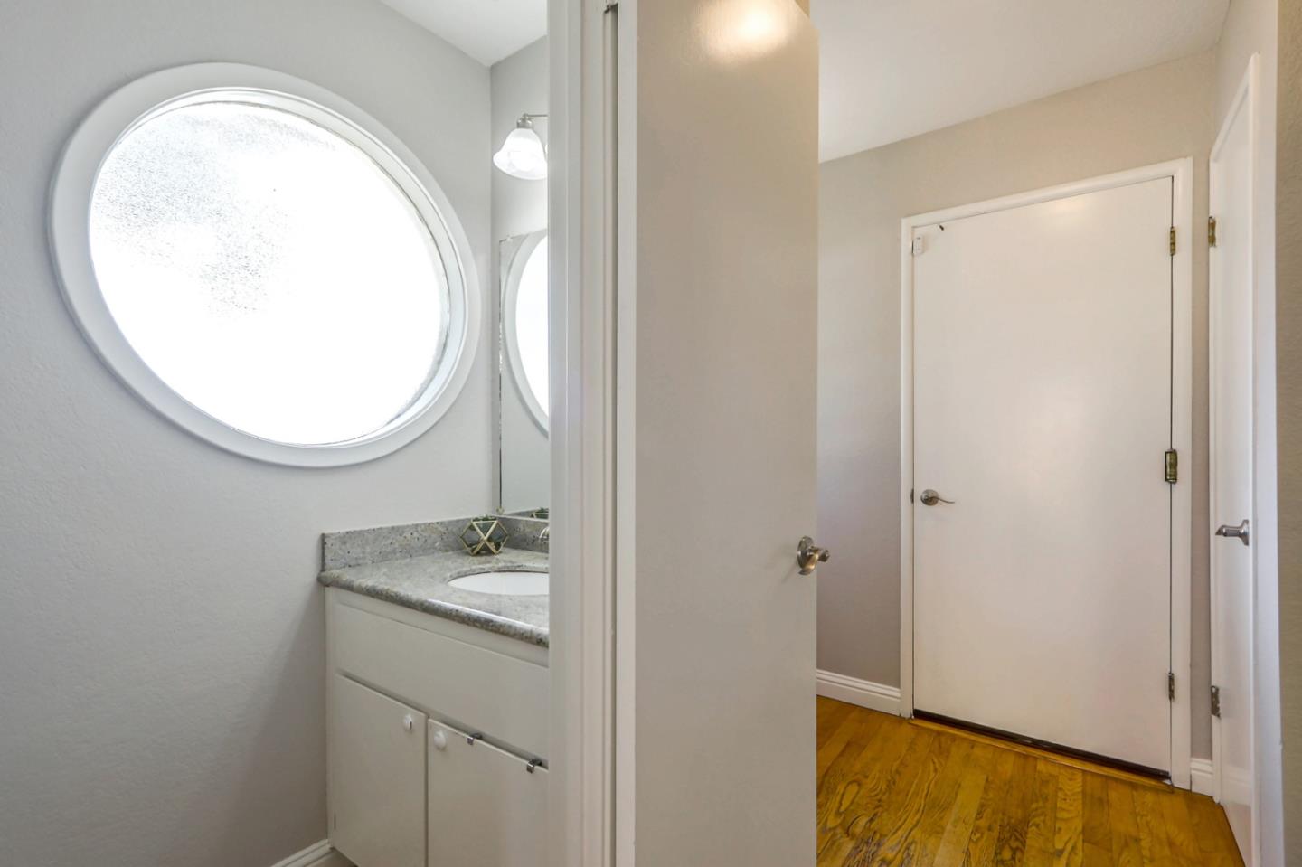 191 Redding Road Campbell, CA 95008 - Photo 13 of 37 a bathroom with a sink and a mirror