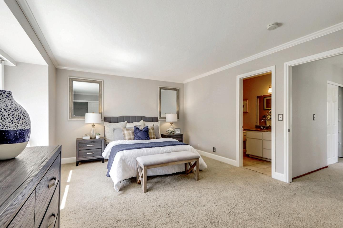 191 Redding Road Campbell, CA 95008 - Photo 23 of 37 a spacious bedroom with a bed and a couch