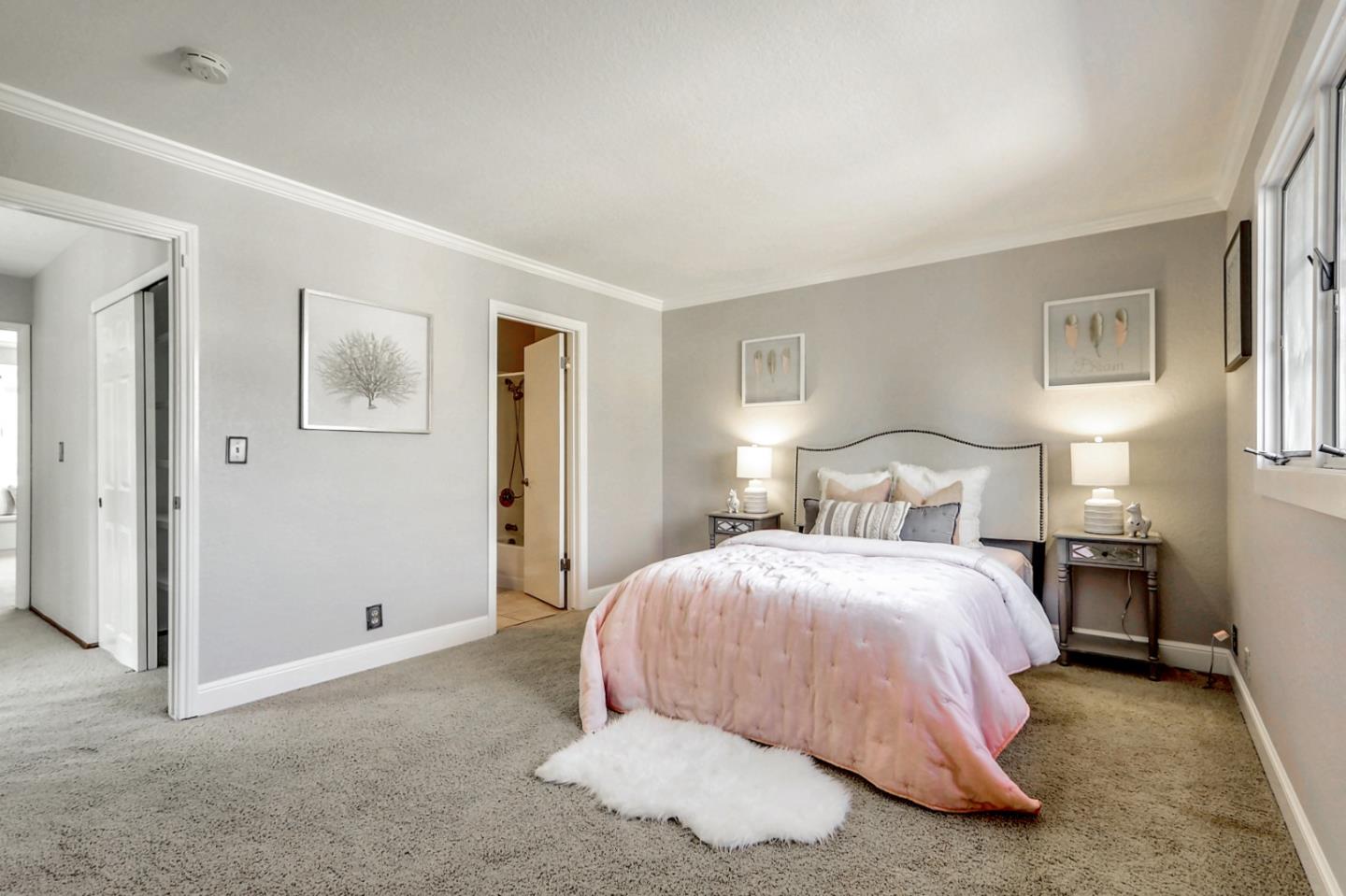 191 Redding Road Campbell, CA 95008 - Photo 29 of 37 a bedroom with a bed and painting on the wall
