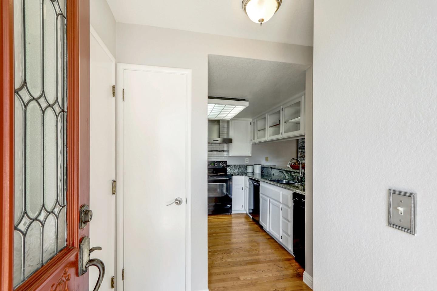 191 Redding Road Campbell, CA 95008 - Photo 5 of 37 a kitchen with stainless steel appliances granite countertop a refrigerator and a stove