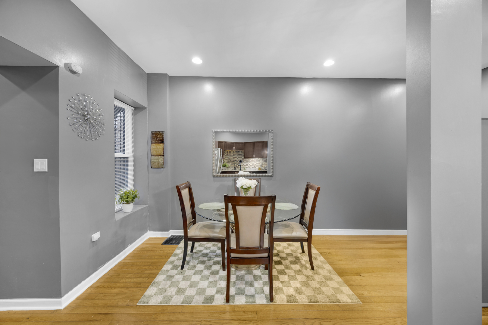 7220 South Carpenter Street Chicago, IL 60621 - Photo 8 of 17 a view of a dining room with furniture and wooden floor