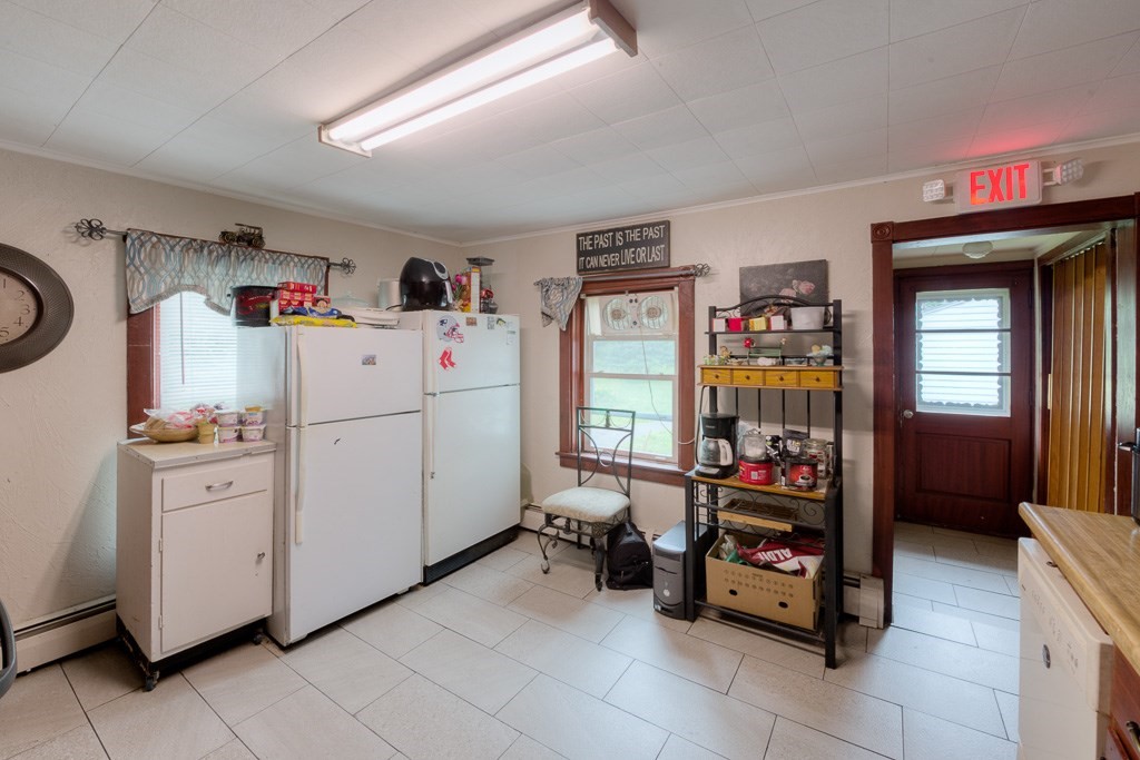92 Mill Street Lancaster, MA 01523 - Photo 15 of 42 a room with storage and utility