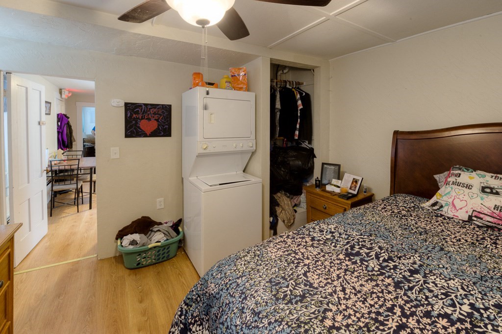 92 Mill Street Lancaster, MA 01523 - Photo 27 of 42 a bedroom with a bed and a tv