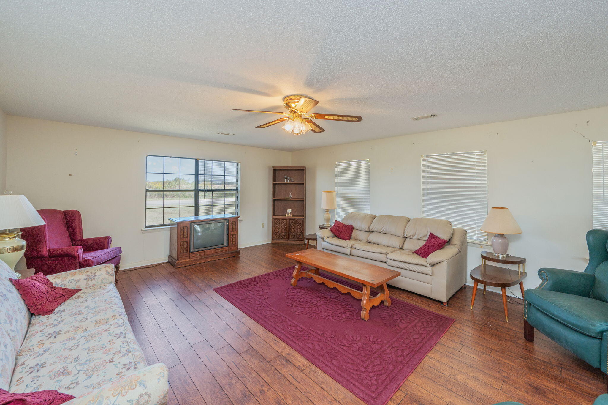 1950 Prescott Road Florala, AL 36442 - Photo 13 of 56 a living room with furniture and a wooden floor