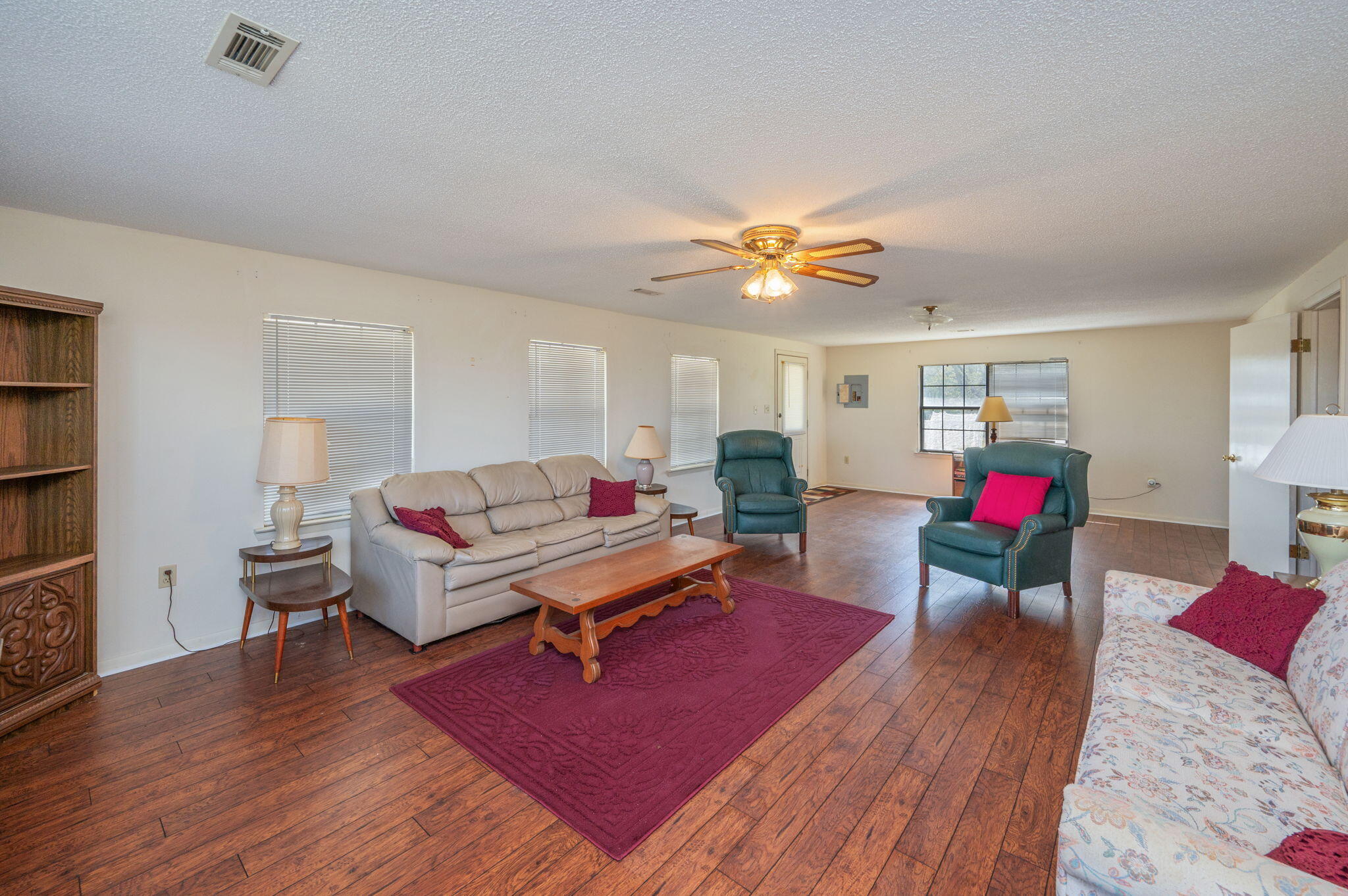 1950 Prescott Road Florala, AL 36442 - Photo 14 of 56 a living room with furniture and wooden floor