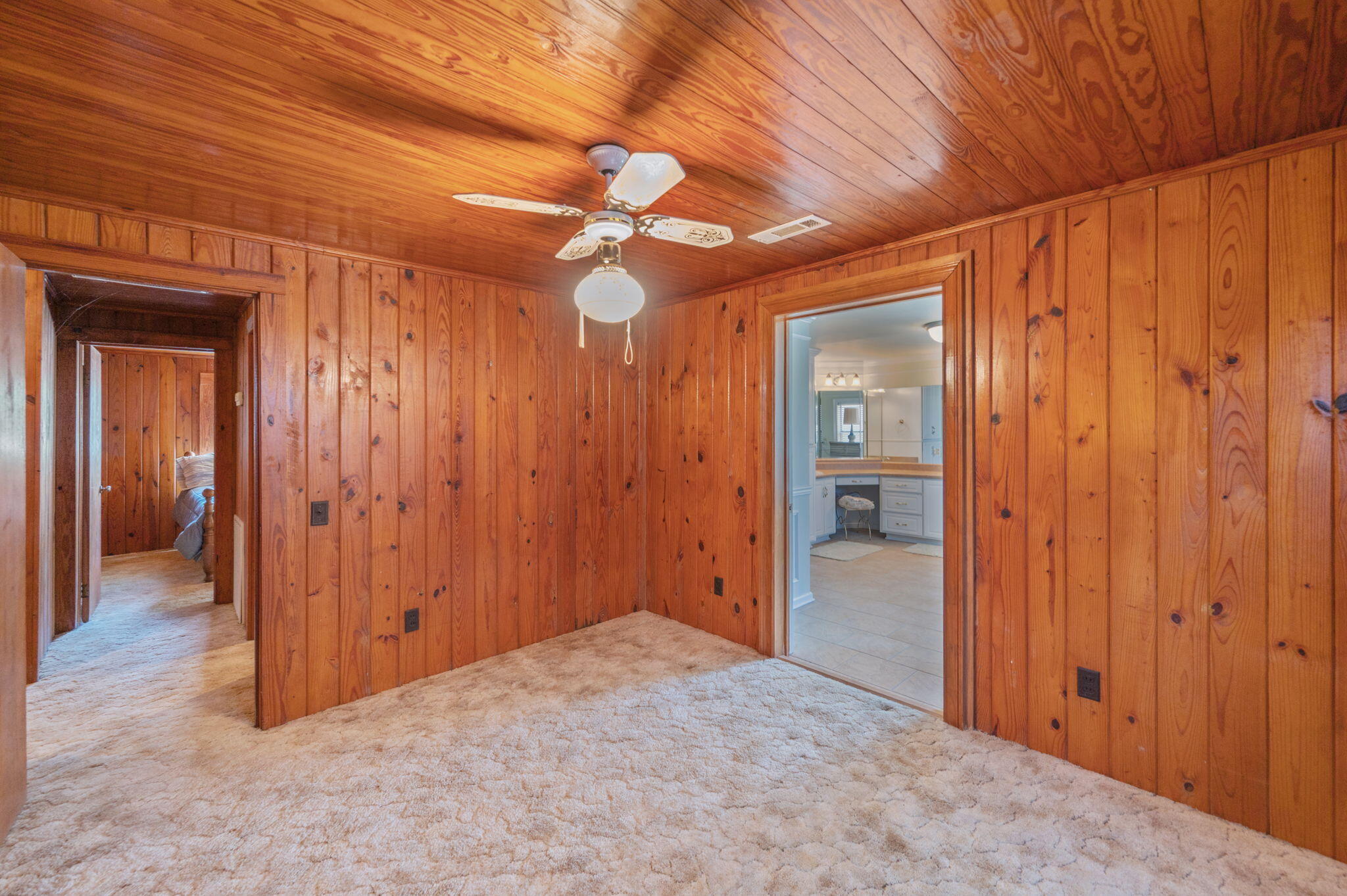 1950 Prescott Road Florala, AL 36442 - Photo 19 of 56 a view of a hallway with wooden shelves
