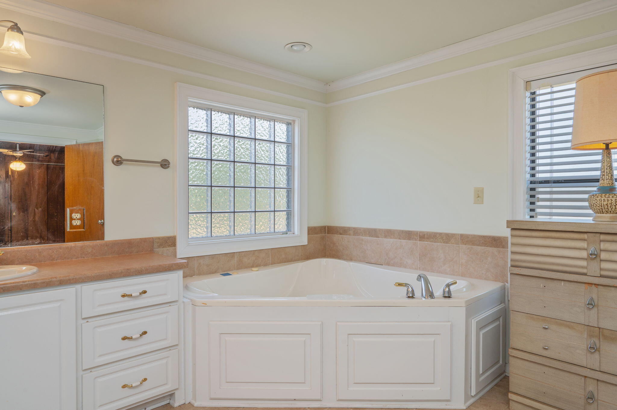 1950 Prescott Road Florala, AL 36442 - Photo 21 of 56 a bedroom with a bed and a window