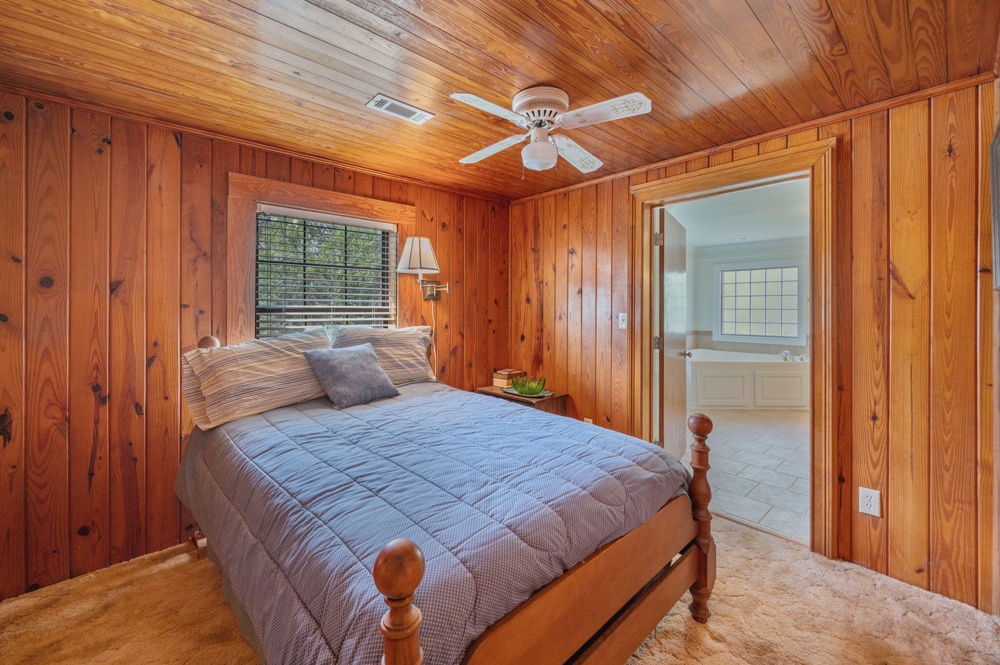 1950 Prescott Road Florala, AL 36442 - Photo 24 of 56 a bedroom with a bed and a window