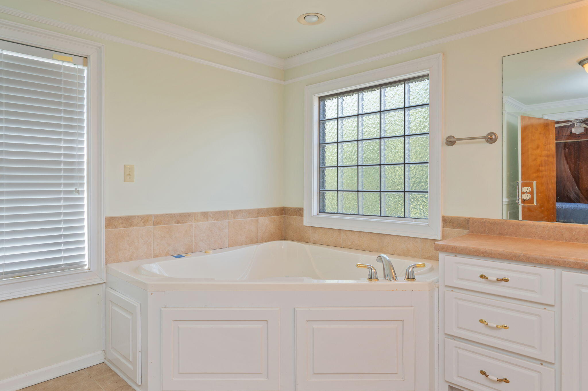 1950 Prescott Road Florala, AL 36442 - Photo 27 of 56 a white bath tub sitting in a bathroom