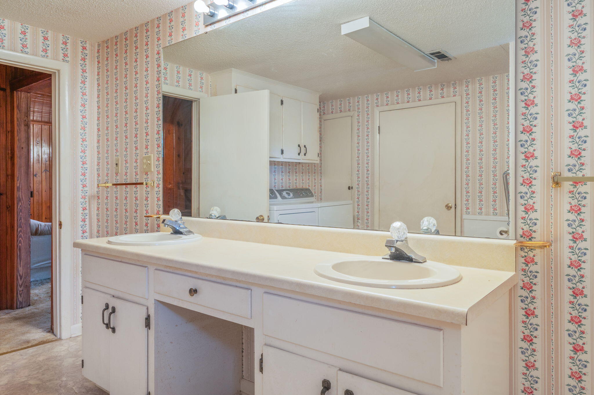 1950 Prescott Road Florala, AL 36442 - Photo 33 of 56 a bathroom with a sink and a mirror