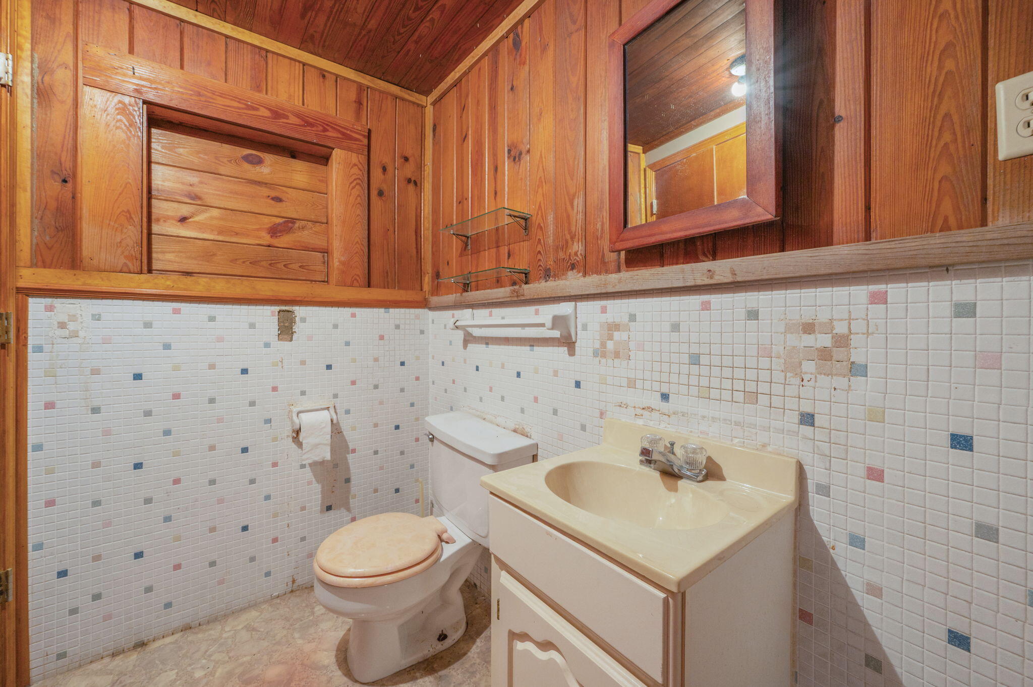 1950 Prescott Road Florala, AL 36442 - Photo 34 of 56 a bathroom with a sink a toilet and shower curtain