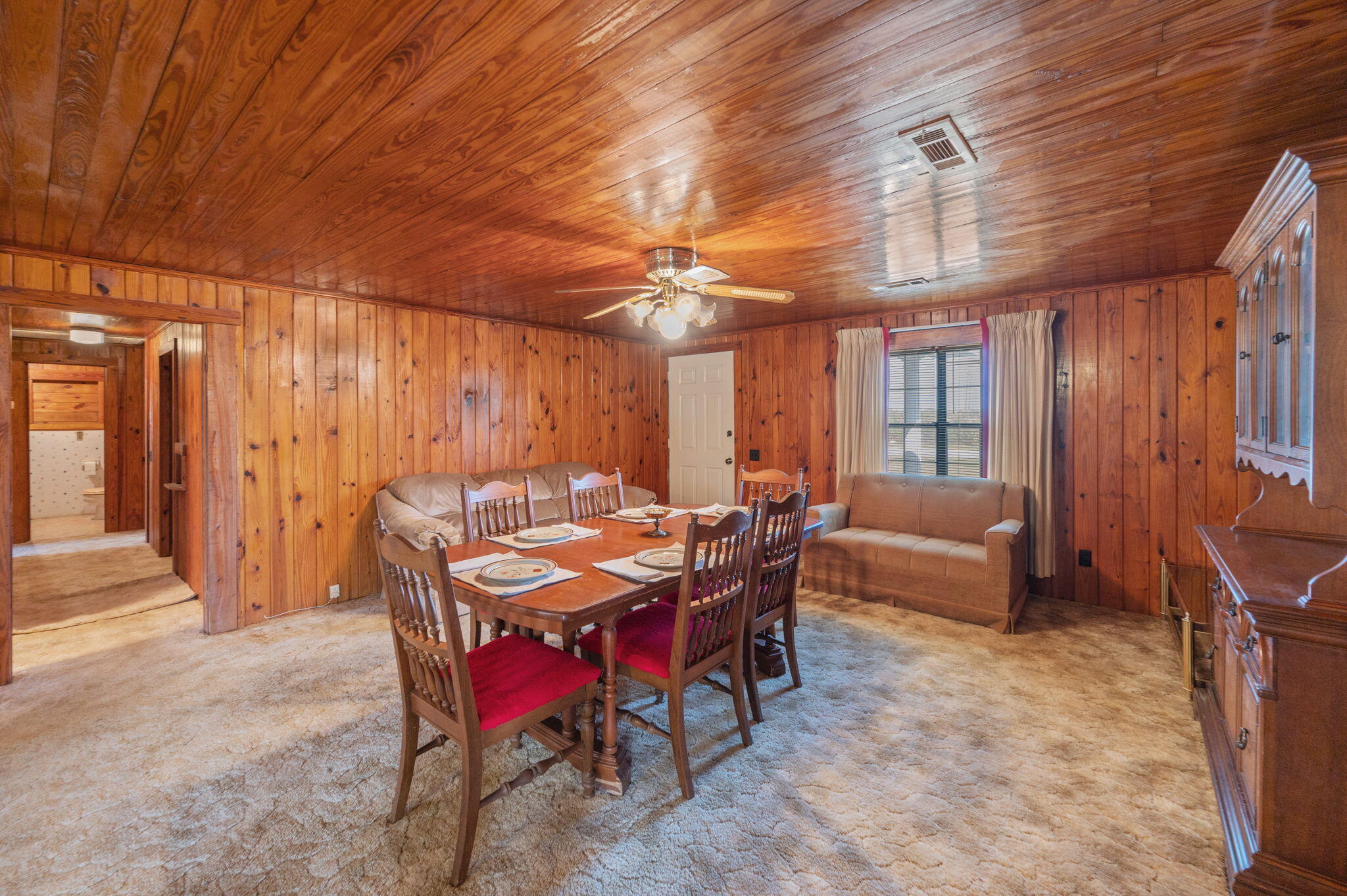 1950 Prescott Road Florala, AL 36442 - Photo 9 of 56 a view of a dining room with furniture window and wooden floor