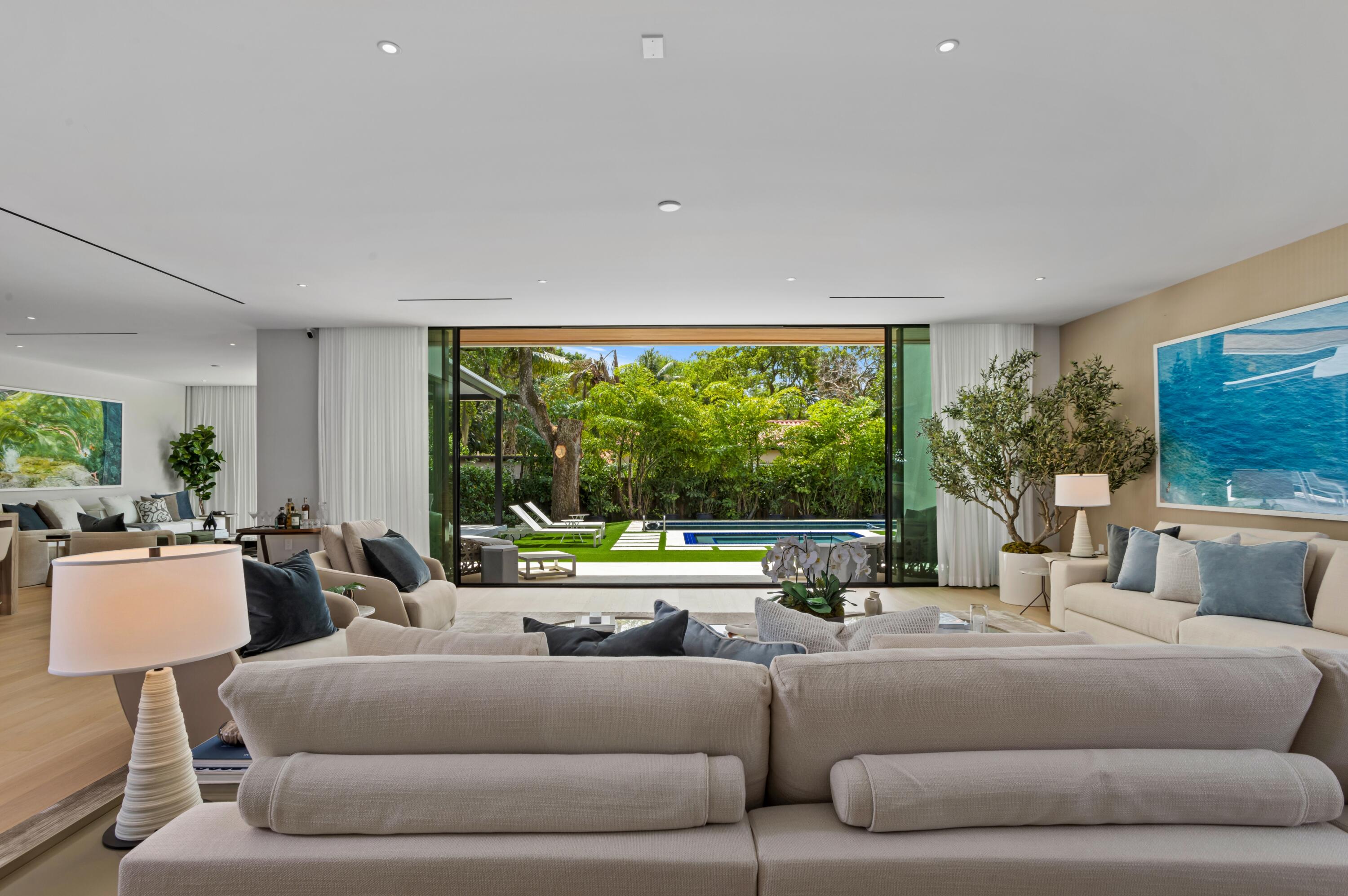 754 Oleander Street Boca Raton, FL 33486 - Photo 5 of 41 a living room with furniture and a large window