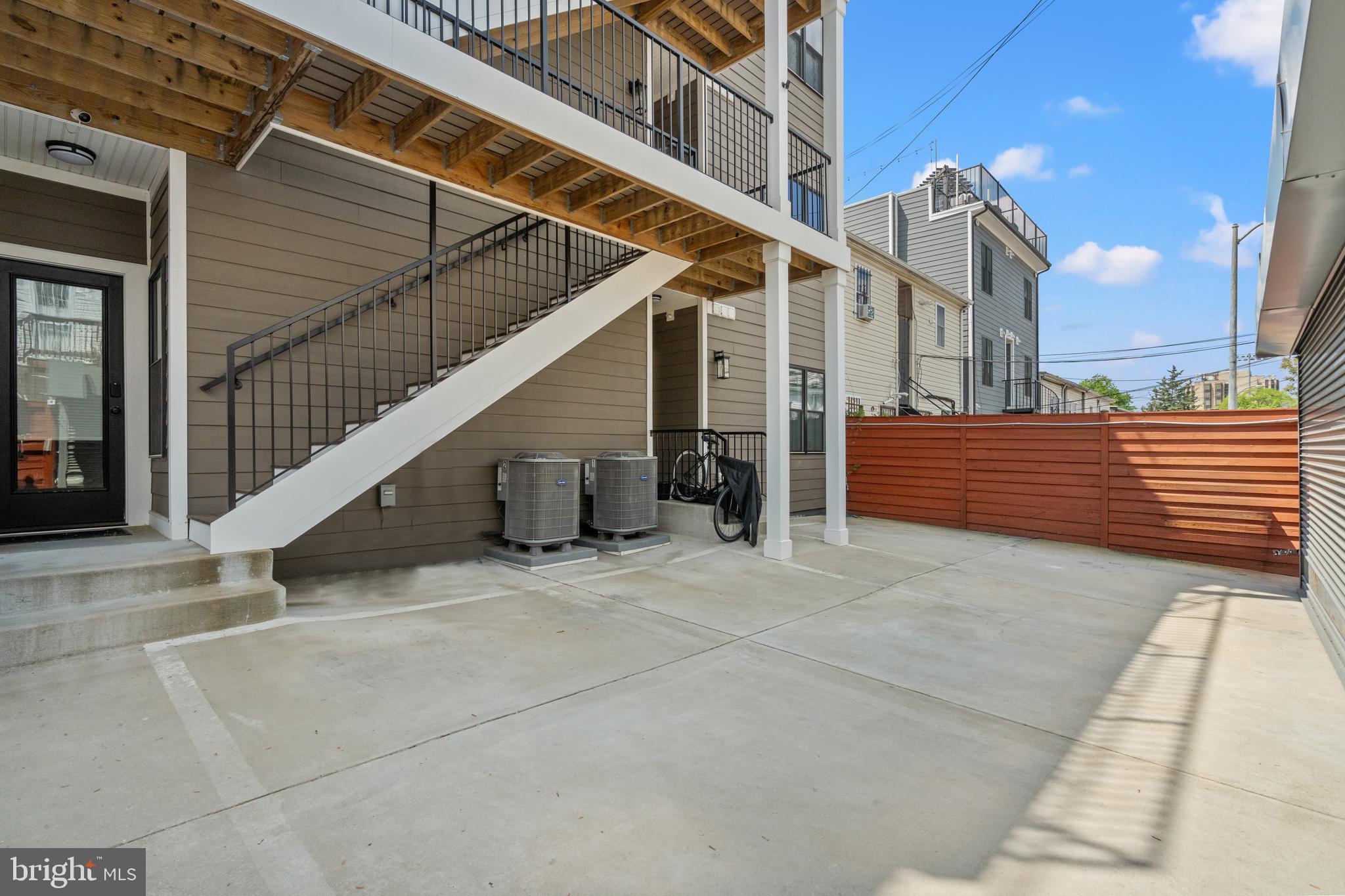 1130 Penn Street Northeast, Unit 6 Washington, DC 20002 - Photo 20 of 21 Large Parking Space with Garage Door