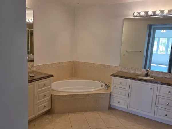 a bathroom with a bathtub sink and toilet