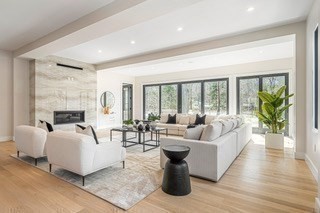 741 Boston Post Road Weston, MA 02493 - Photo 11 of 28 a living room with furniture and a large window
