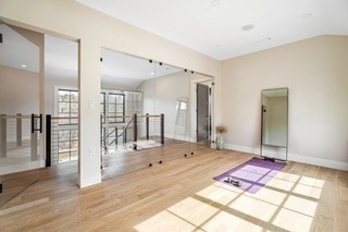 741 Boston Post Road Weston, MA 02493 - Photo 19 of 28 a spacious bathroom with a double vanity sink and a mirror