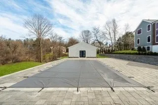 a house with yard and trees