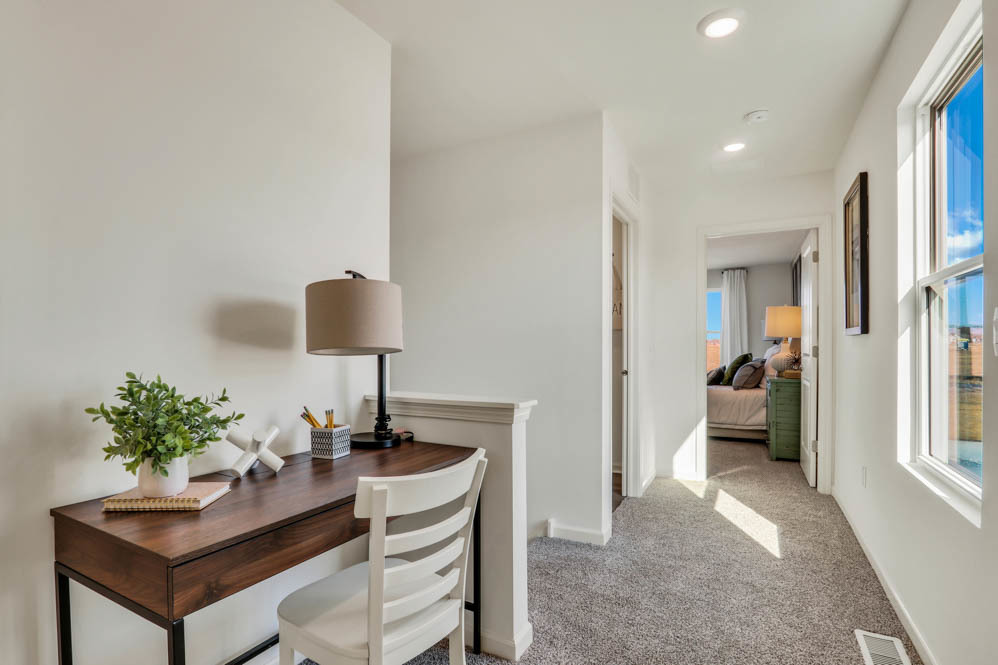 2489 Semillon Street Oswego, IL 60543 - Photo 21 of 27 a living room with furniture and a table