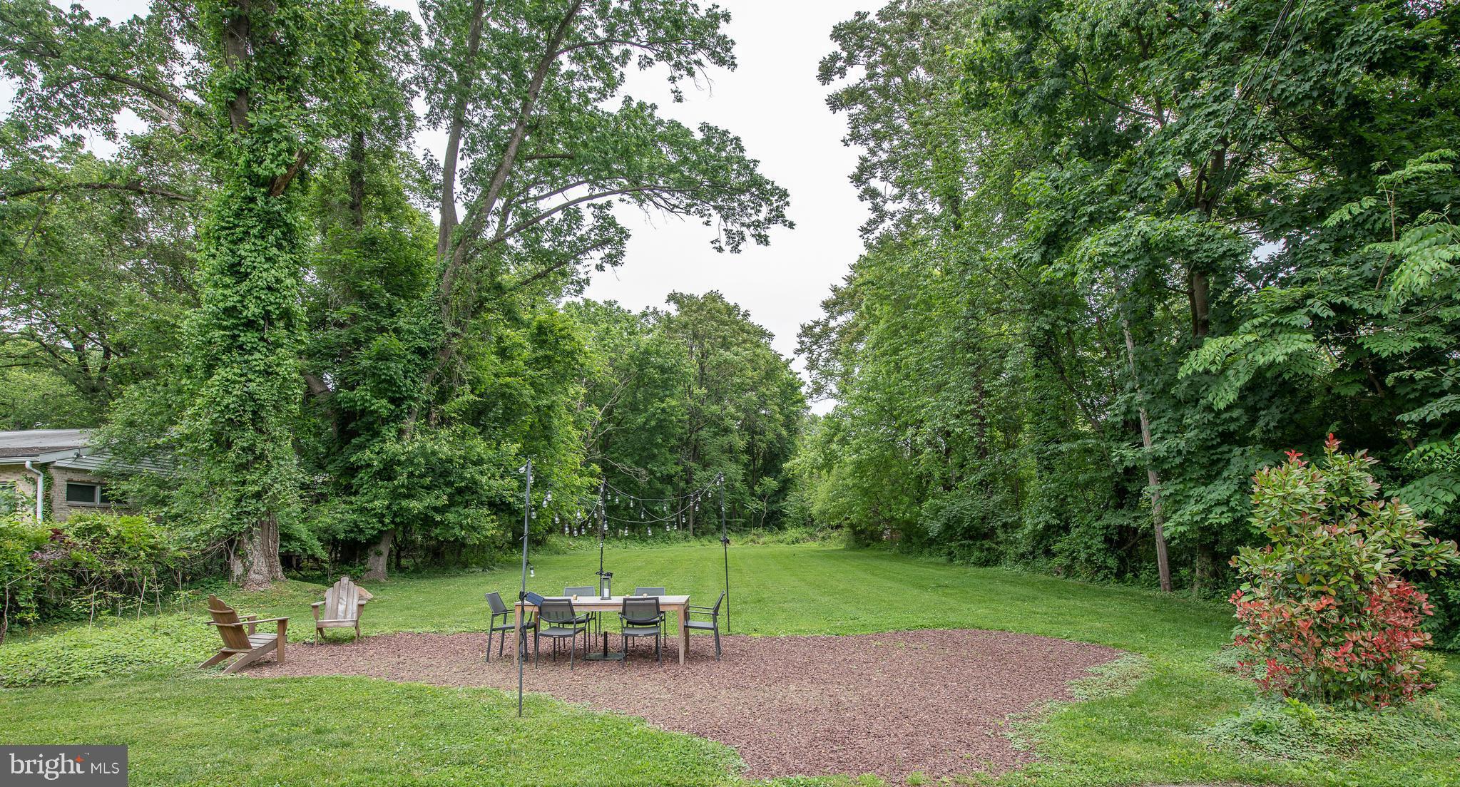 231 Stacey Road Penn Valley, PA 19072 - Photo 28 of 31 Backyard with outdoor entertaining area