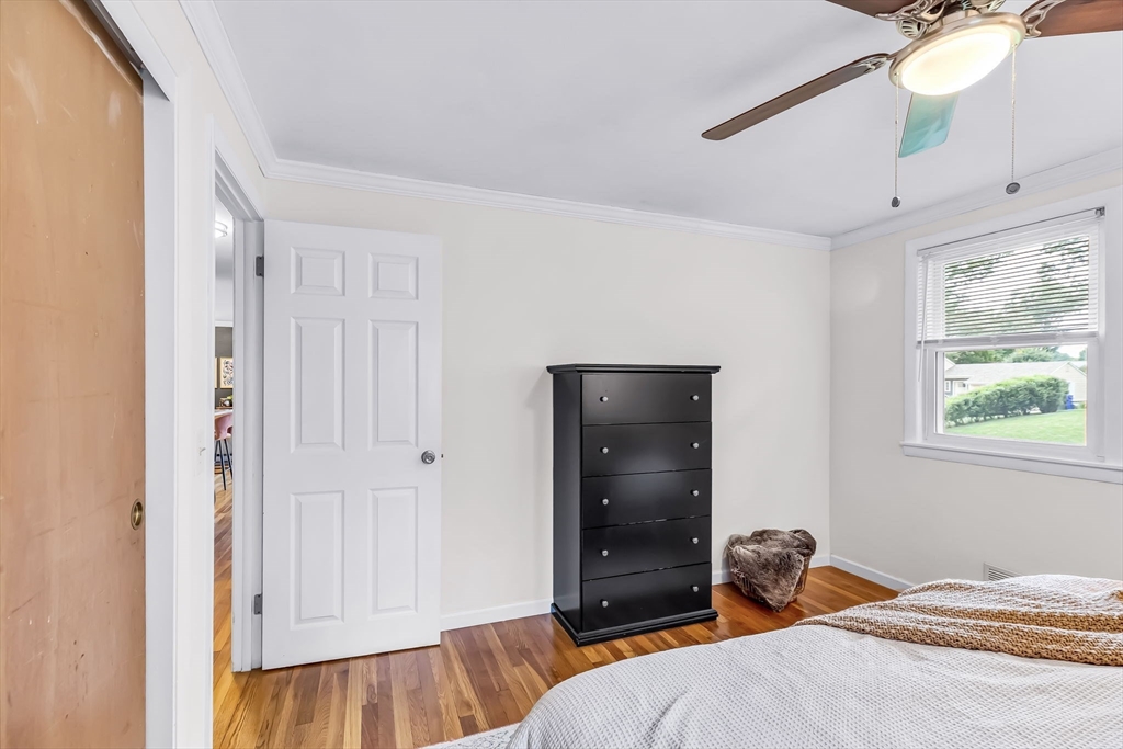 71 Endecott Street Springfield, MA 01118 - Photo 24 of 42 a bedroom with a bed and a window