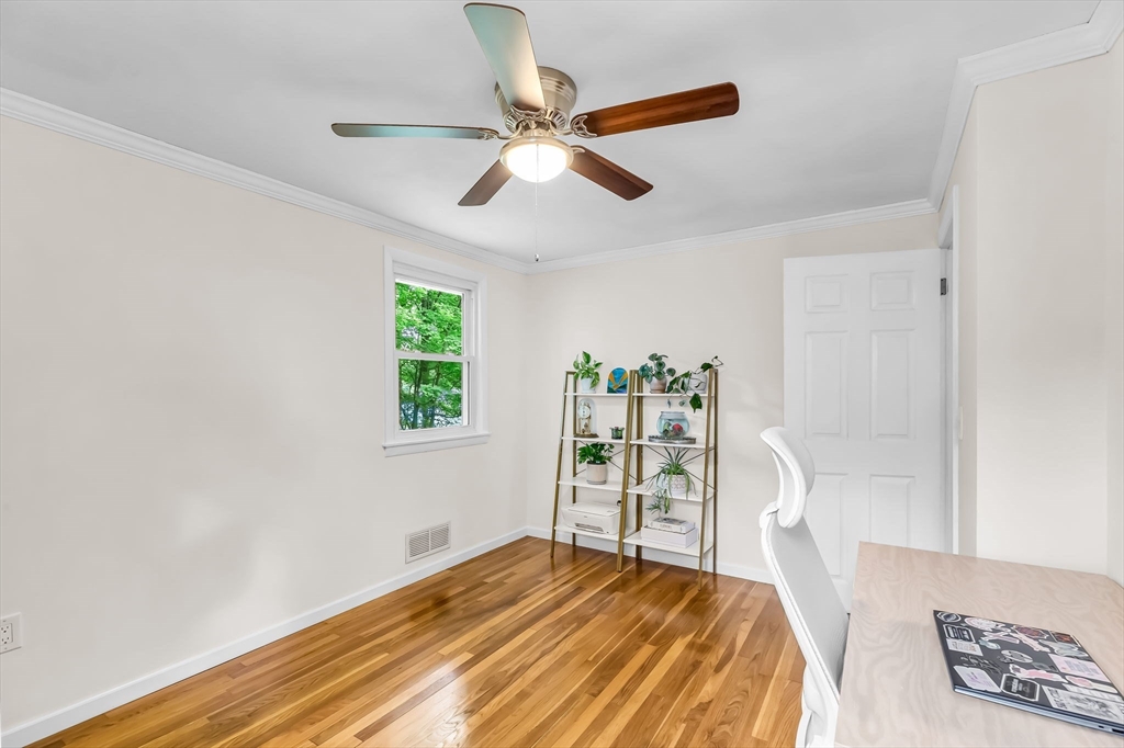 71 Endecott Street Springfield, MA 01118 - Photo 28 of 42 a bedroom with a bed and a window