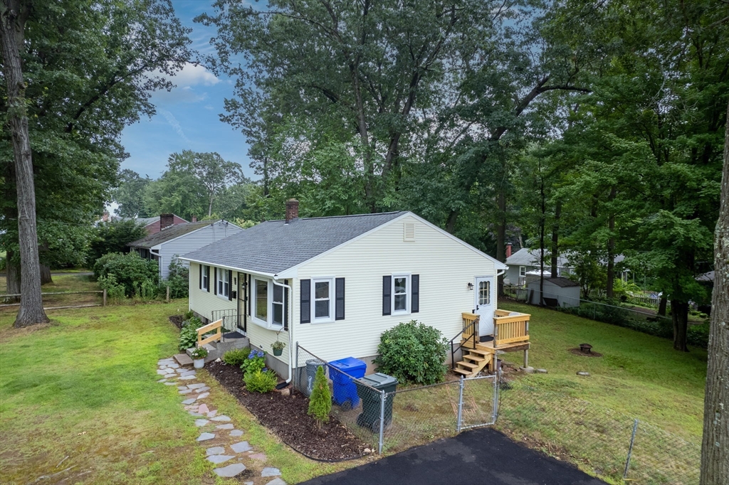 71 Endecott Street Springfield, MA 01118 - Photo 37 of 42 a front view of a house with garden