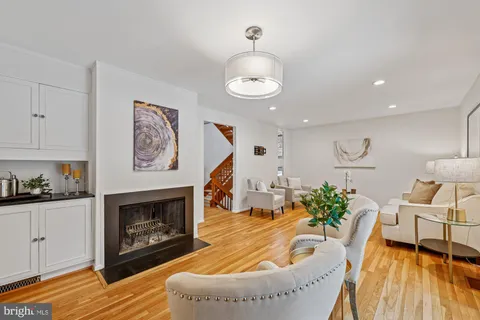 a bedroom with a bed and a table