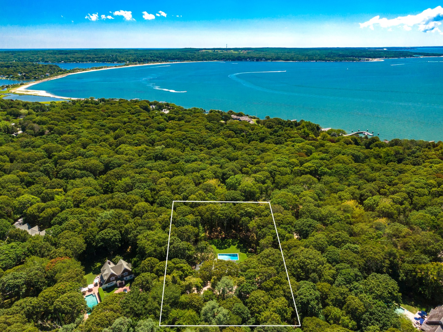 22 Oak Drive Sag Harbor, NY 11963 - Photo 2 of 35 a view of a field with an ocean