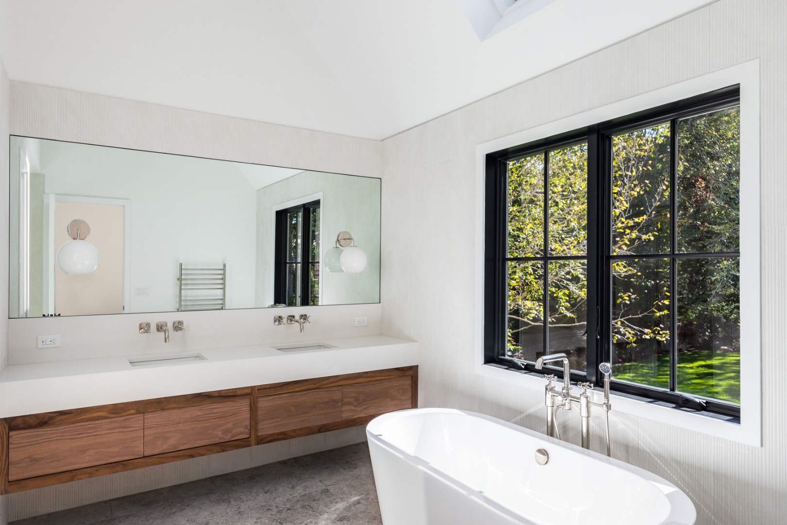 22 Oak Drive Sag Harbor, NY 11963 - Photo 21 of 35 a bathroom with a double vanity sink and a large mirror