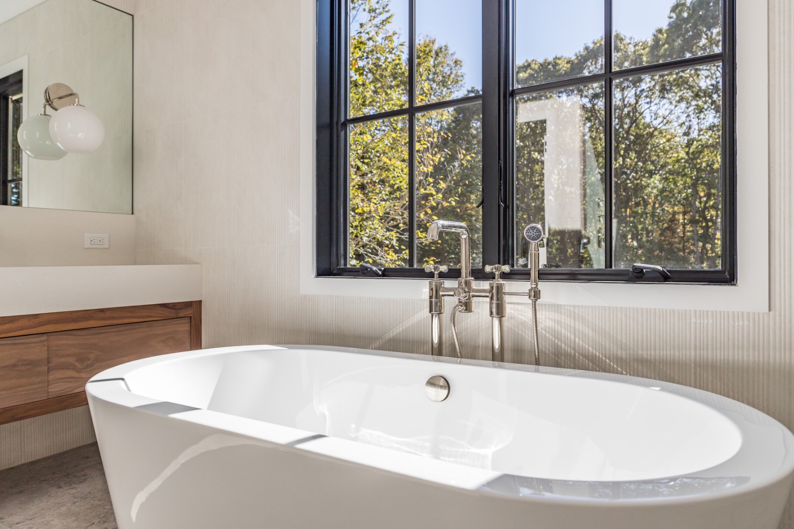 22 Oak Drive Sag Harbor, NY 11963 - Photo 24 of 35 a bath tub sitting in a bathroom next to a window