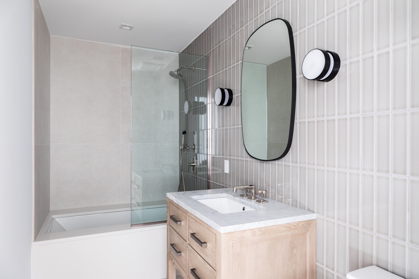 22 Oak Drive Sag Harbor, NY 11963 - Photo 28 of 35 a bathroom with a sink a toilet and a mirror