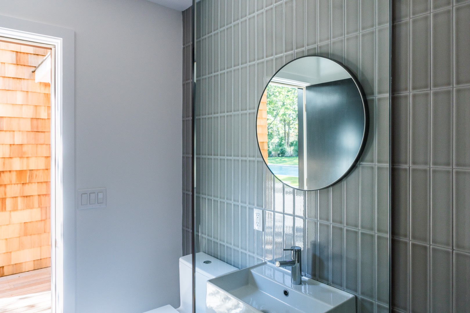 22 Oak Drive Sag Harbor, NY 11963 - Photo 32 of 35 a bathroom with a sink and a mirror