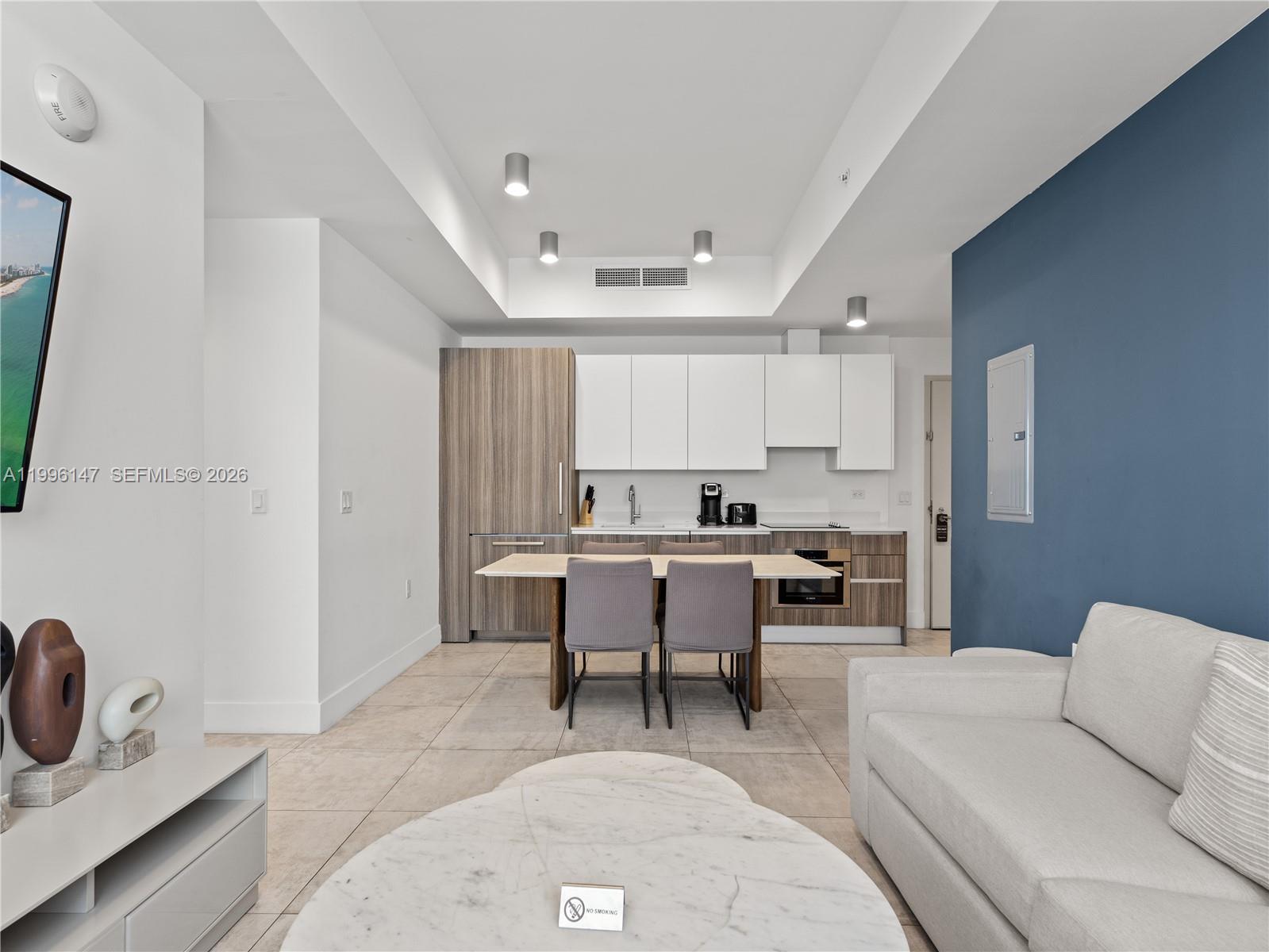 239 Southwest 9th Street, Unit 1403 Miami, FL 33130 - Photo 23 of 33 a living room with furniture a sink and a window