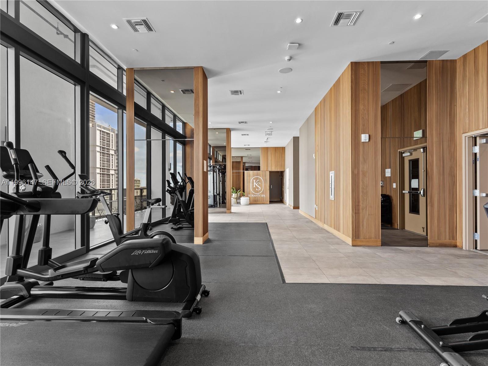 239 Southwest 9th Street, Unit 1403 Miami, FL 33130 - Photo 25 of 33 a view of a room with gym equipment