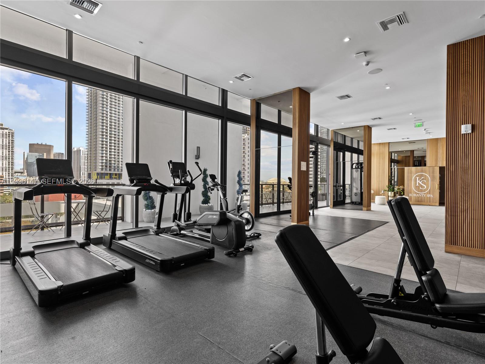 239 Southwest 9th Street, Unit 1403 Miami, FL 33130 - Photo 26 of 33 a view of a room with gym equipment